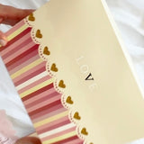 Pijama Quentinho Rosa com Estampa de Cachorrinhos e corações