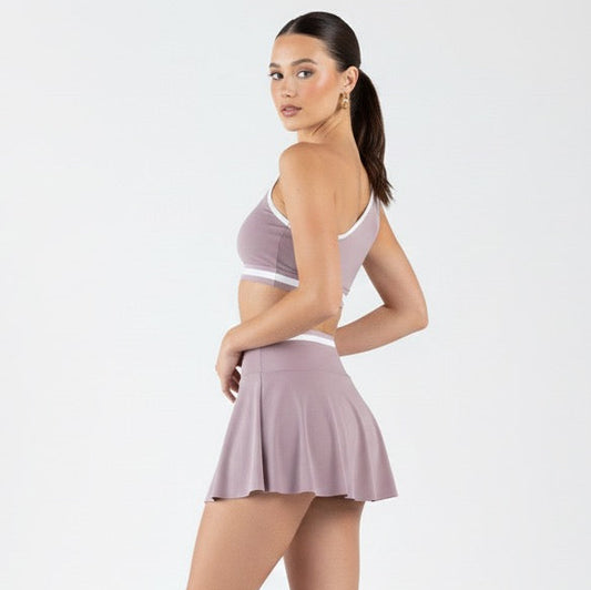 Conjunto Top lateral e Short Saia Lilas com faixa branca de Poliamida